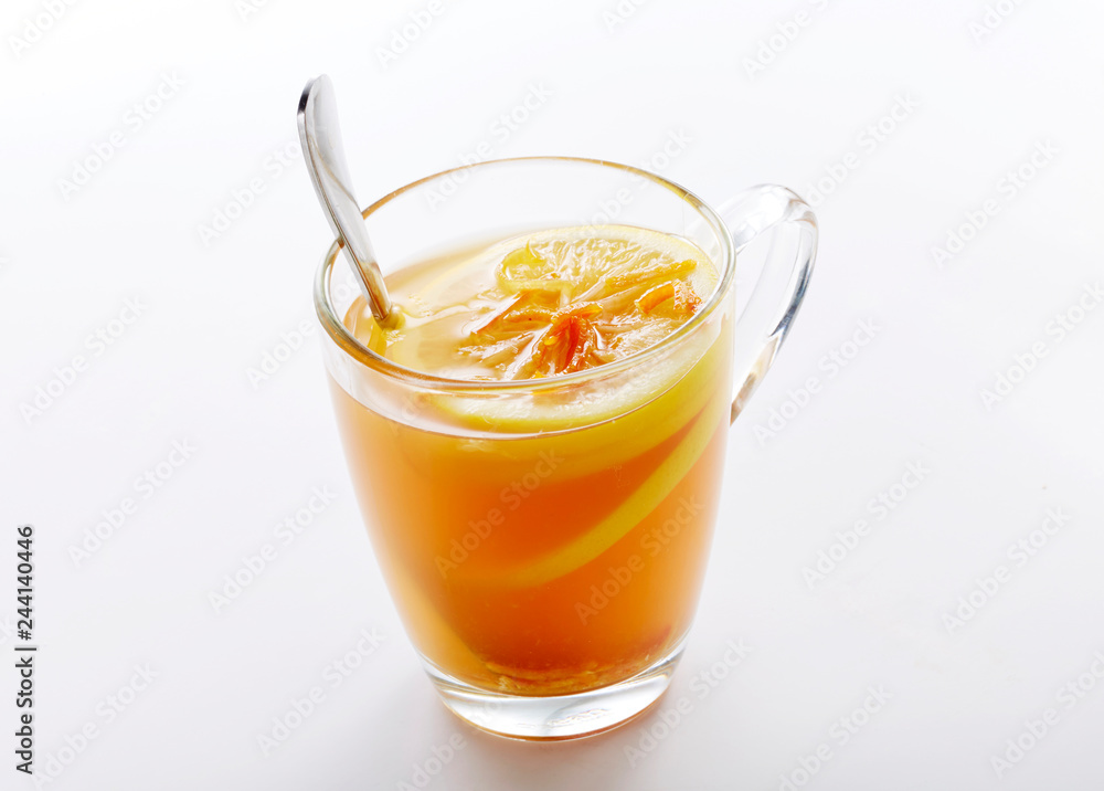Delicious hot lemon tea on a white background