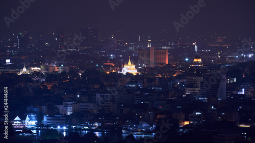 goden mountain temple of bangkok with cityscape building background