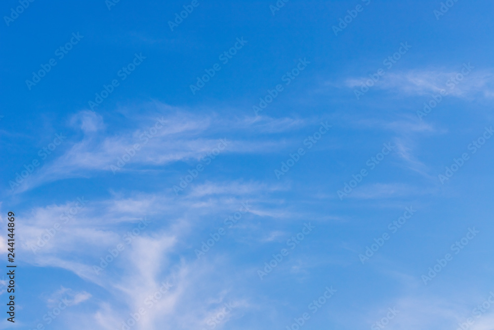 Naklejka premium Blue sky with clouds background