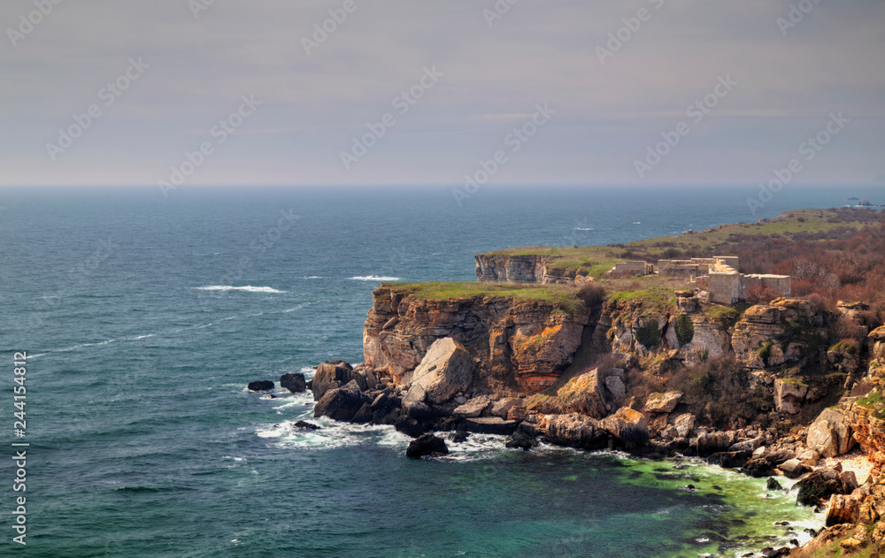Beautiful landscape with blue sea and rocky shore