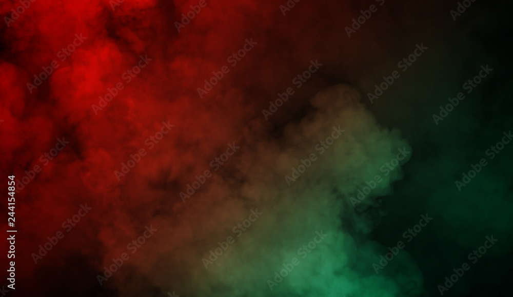 Abstract red vs green smoke steam moves on a black background . The concept of aromatherapy
