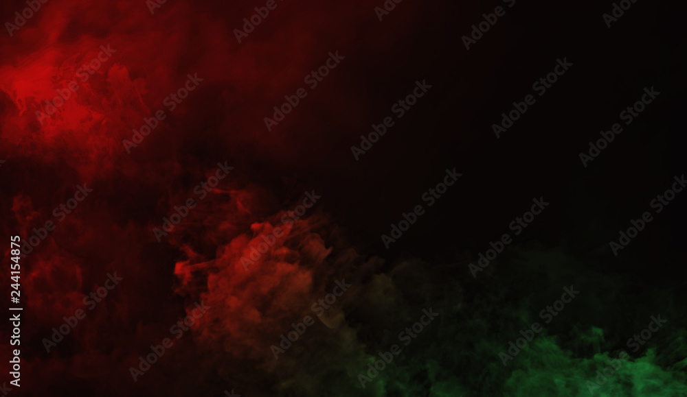 Abstract red vs green smoke steam moves on a black background . The concept of aromatherapy