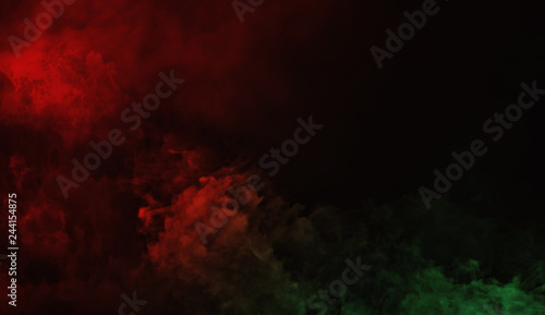 Abstract red vs green smoke steam moves on a black background . The concept of aromatherapy