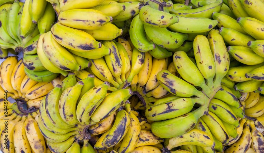 Pile of small bananas background