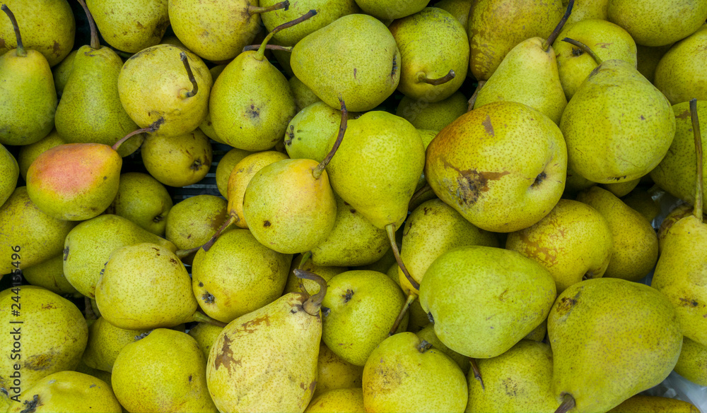 Pile of bio pears background
