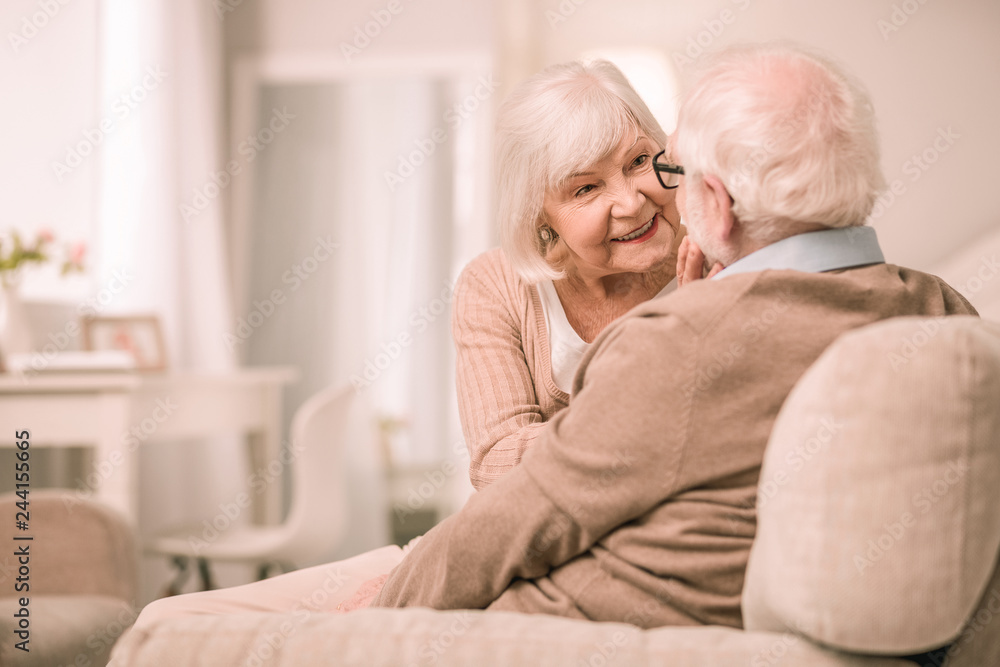 Kind female person talking to her husband Kind female person talking to her husband