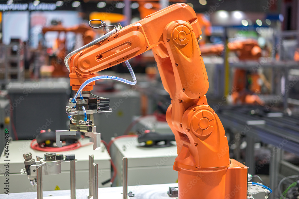 robot arm in factory robot arm in factory