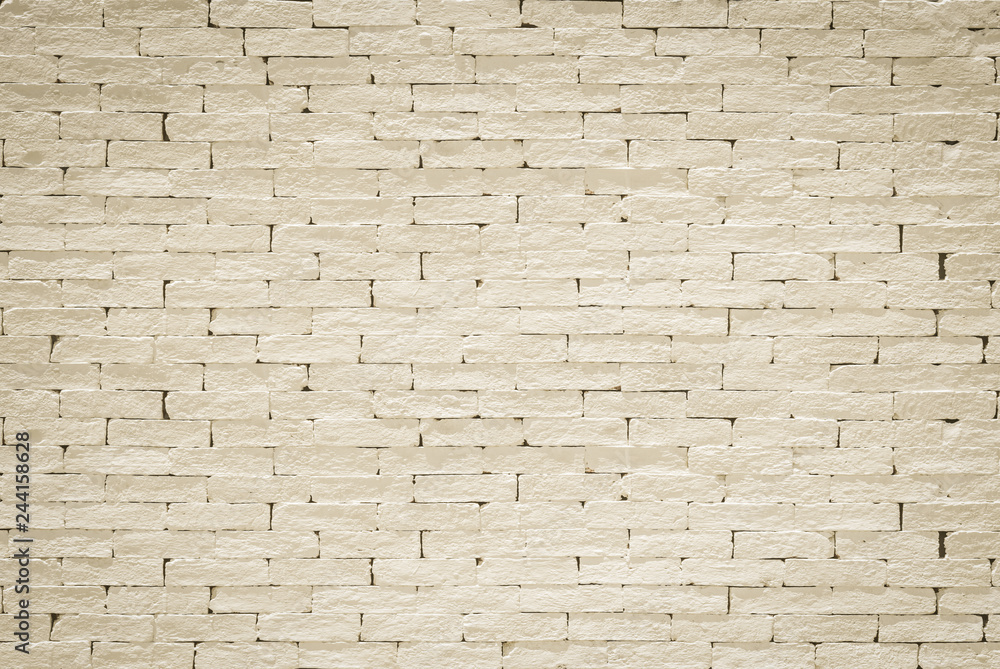 Brick wall pattern texture background painted in light yellow beige color Brick wall pattern texture background painted in light yellow beige color