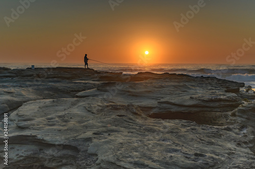 Sunrise , the Sea and the Fisherman