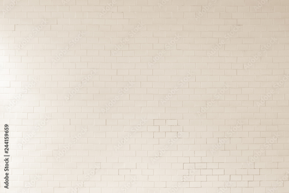 Brick wall tile texture background painted in antique sepia white Brick wall tile texture background painted in antique sepia white