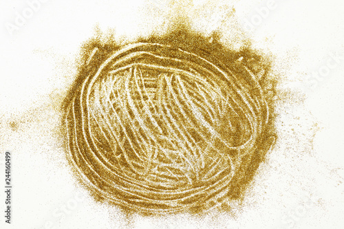 Closeup of golden glitter d...