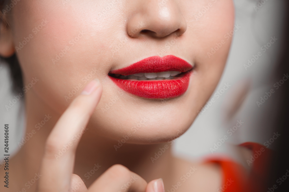 Fototapeta premium Red Sexy Lips closeup. Make up concept. Beautiful Perfect Lips.