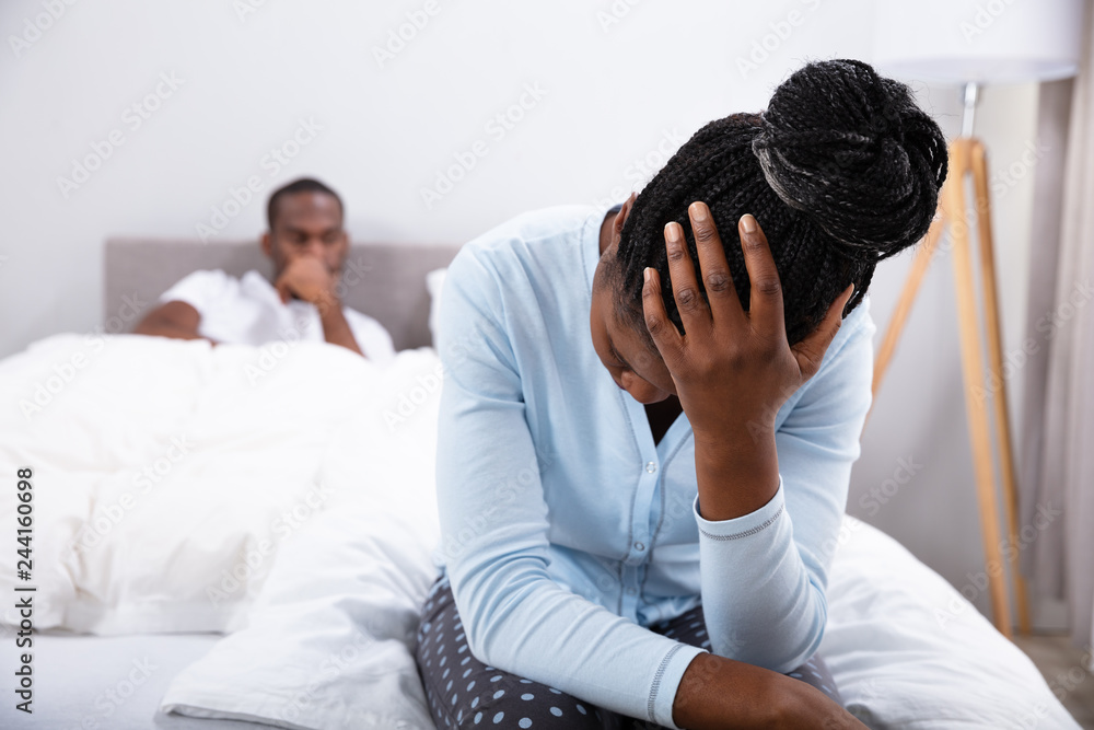 Sad Woman Sitting On Bed Sad Woman Sitting On Bed