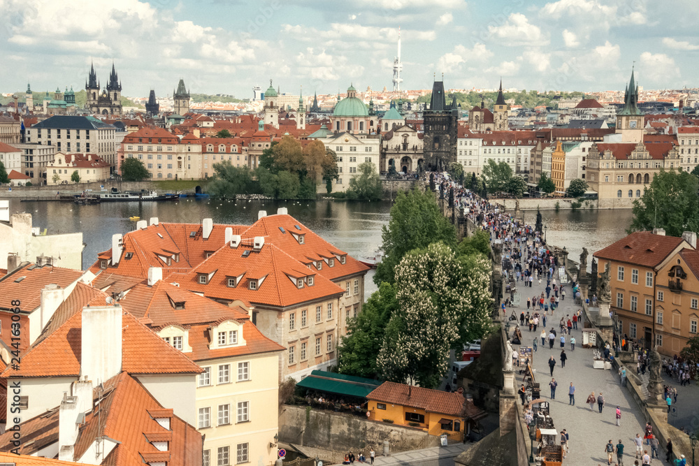 Obraz premium Top view on crowd of tourists on Charles bridge in Prague, Czech Republic