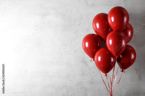  Balloons on concreat wall background