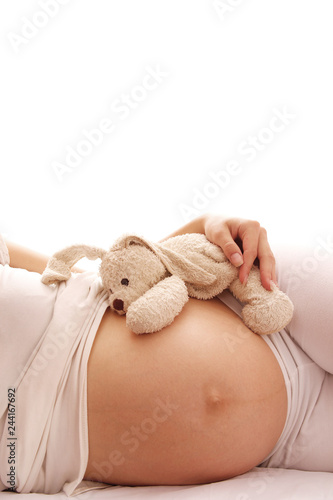 Pregnant woman on a white background