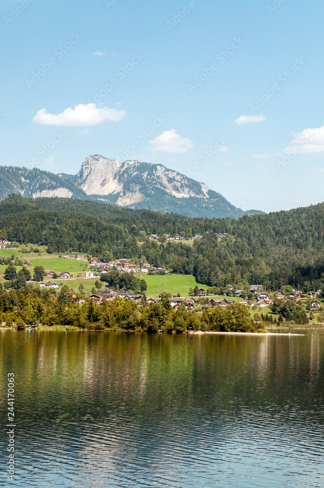 Alpbach lake in the austrian alps on a sunny day.