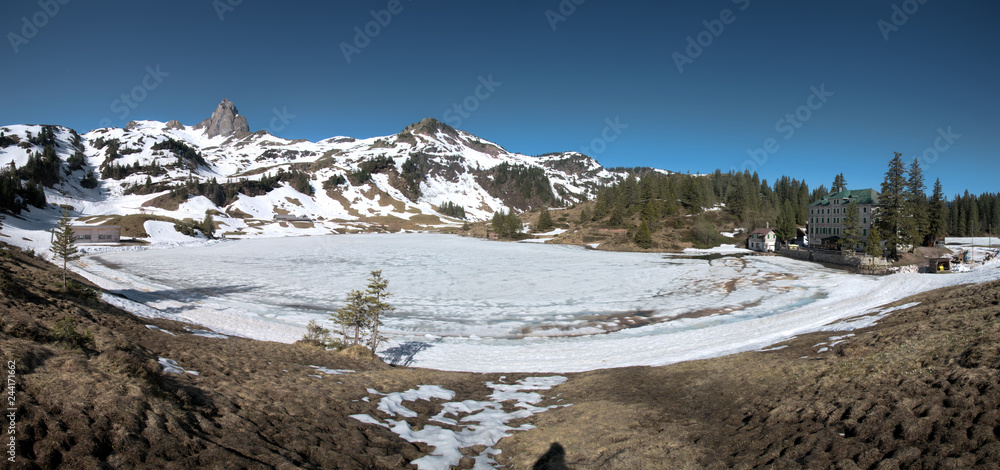 Seebenalpsee; Lake on Flumserberg at start of Spring thaw