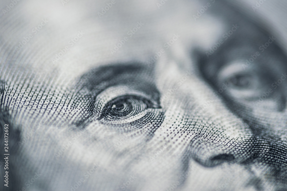 © konoplizkaya - Macro One Hundred Dollar Bills