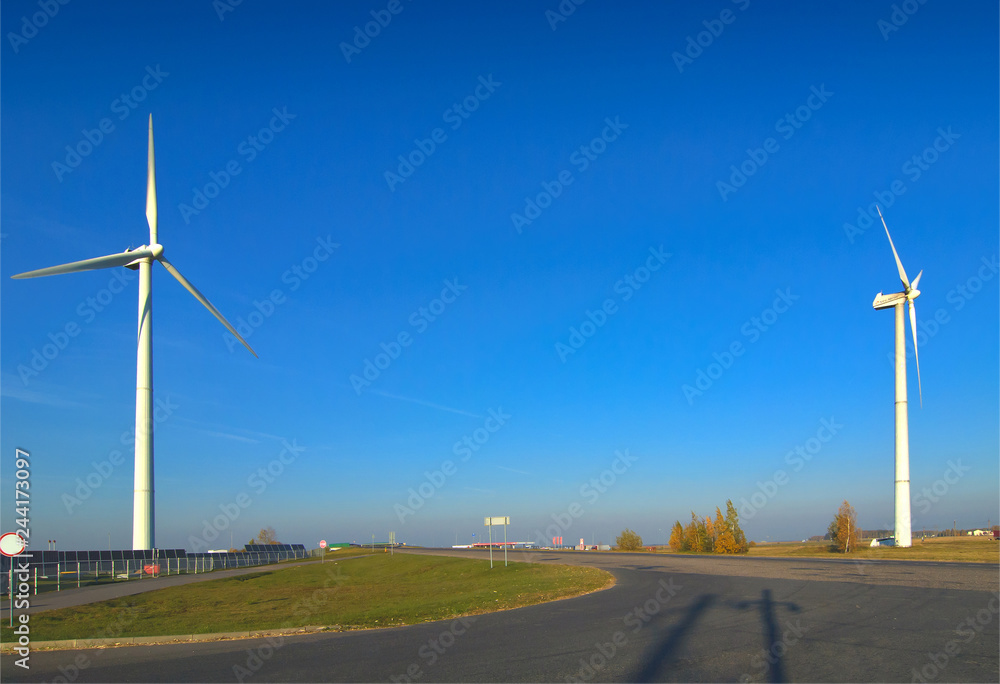 Belarus. Wind generator and solar panels by the road