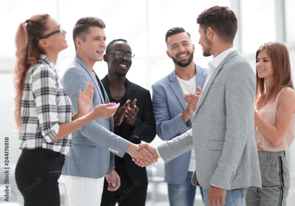 Business people shaking hands a meeting Business people shaking hands a meeting