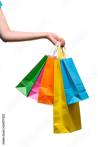 Woman hands with shopping bags.