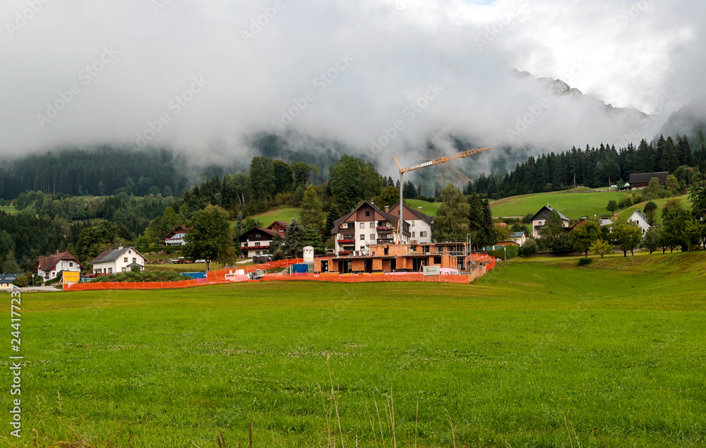 Fototapeta premium Rural village in the Austrian Alps on a cloudy day