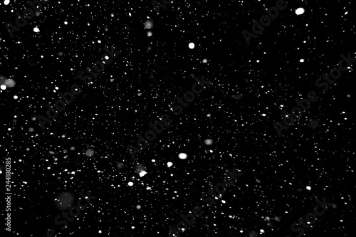 falling snow at night, black background with white spots, snowflakes on the background