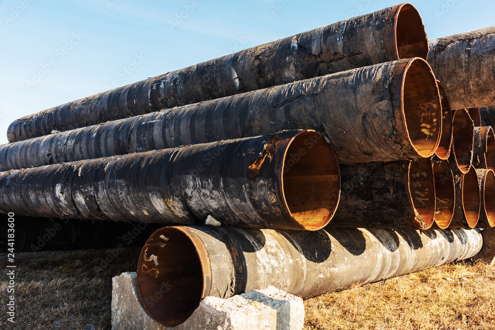 Composition of gas pipeline equipment and high pressure gas pipelines. Stock Photo Adobe Stock