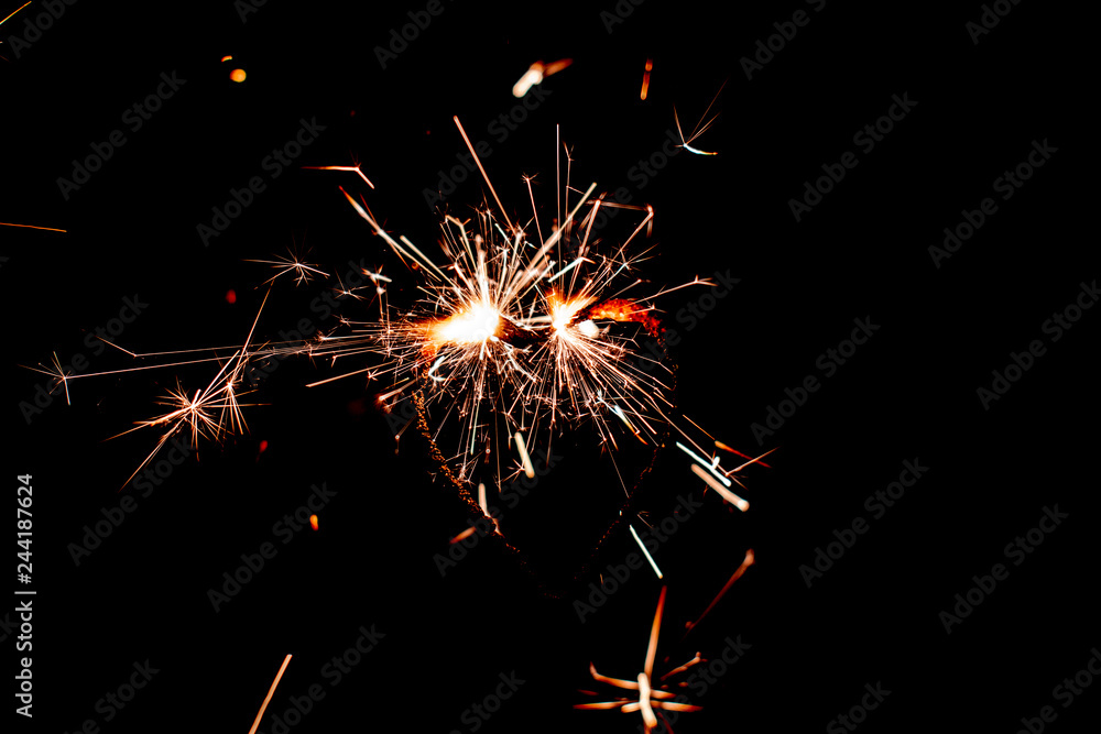 Fire sparklers on black background - Image Fire sparklers on black background - Image