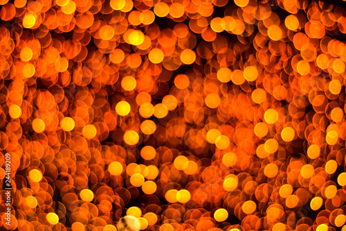 Orange abstract bokeh background. Merry Christmas and New Year background