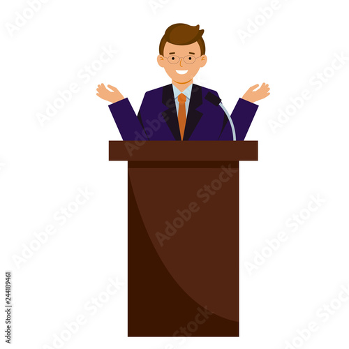 Lecturer speaks. A young man in a suit speaking, reading a report.