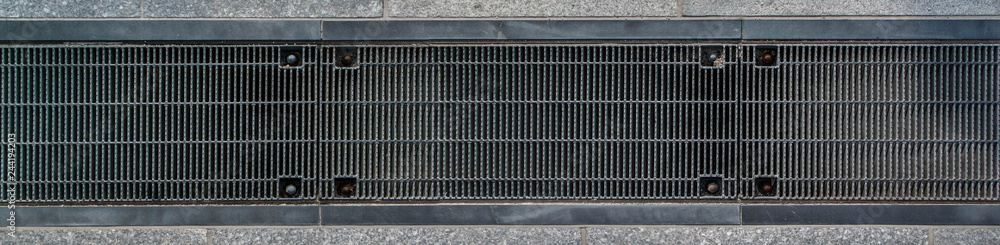 Metal Lids for Drainage on the Side of the Japanese Street Metal Lids for Drainage on the Side of the Japanese Street