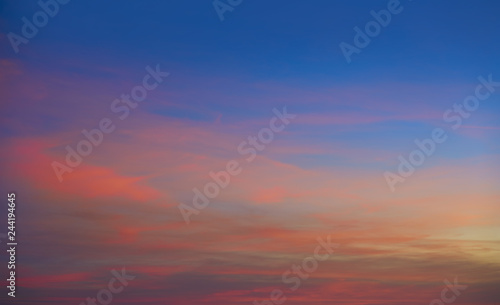 Sunset clouds in orange and blue © lunamarina