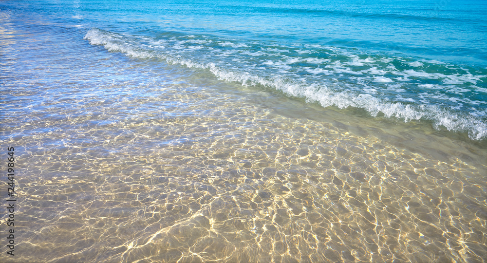 Clear beach water sand in Costa Blanca Clear beach water sand in Costa Blanca