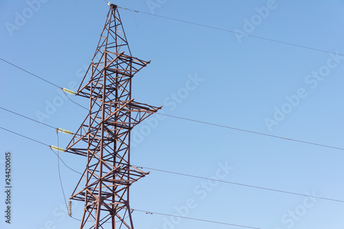 View of electrics, electric lines on the background of blue sky and good weather.