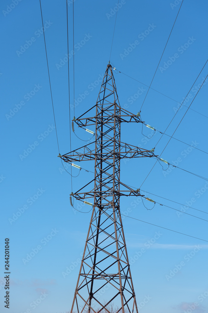 View of electrics, electric lines on the background of blue sky and good weather. View of electrics, electric lines on the background of blue sky and good weather.