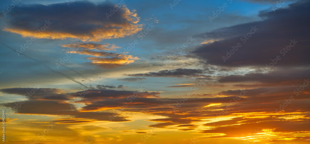 Obraz premium Sunset sky clouds in orange and blue