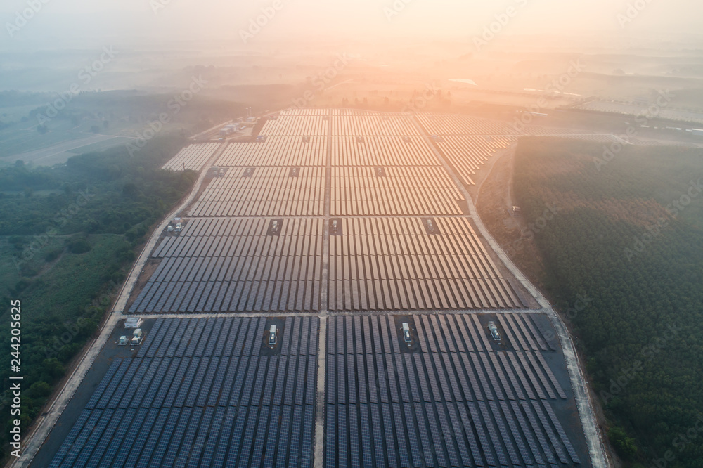 Solar energy farm. High angle view of solar panels on an energy farm. full frame background texture.