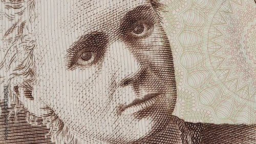 Marie Curie on Poland zloty close up slow rotating. Famous scientist and inventor in chemistry and physics. Stock video footage photo