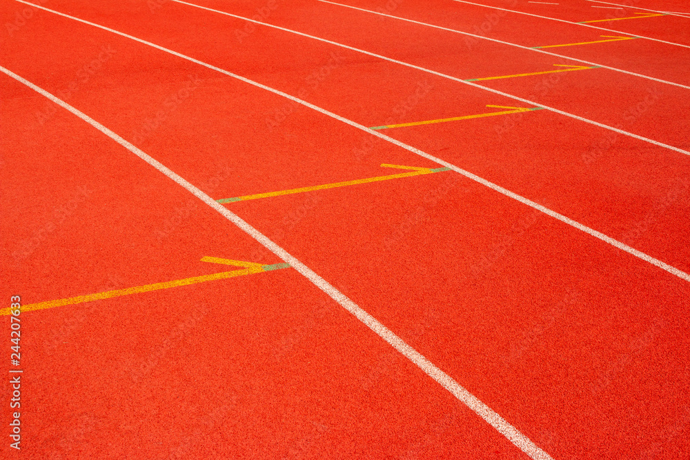 Red running track Synthetic rubber on the athletic stadium.