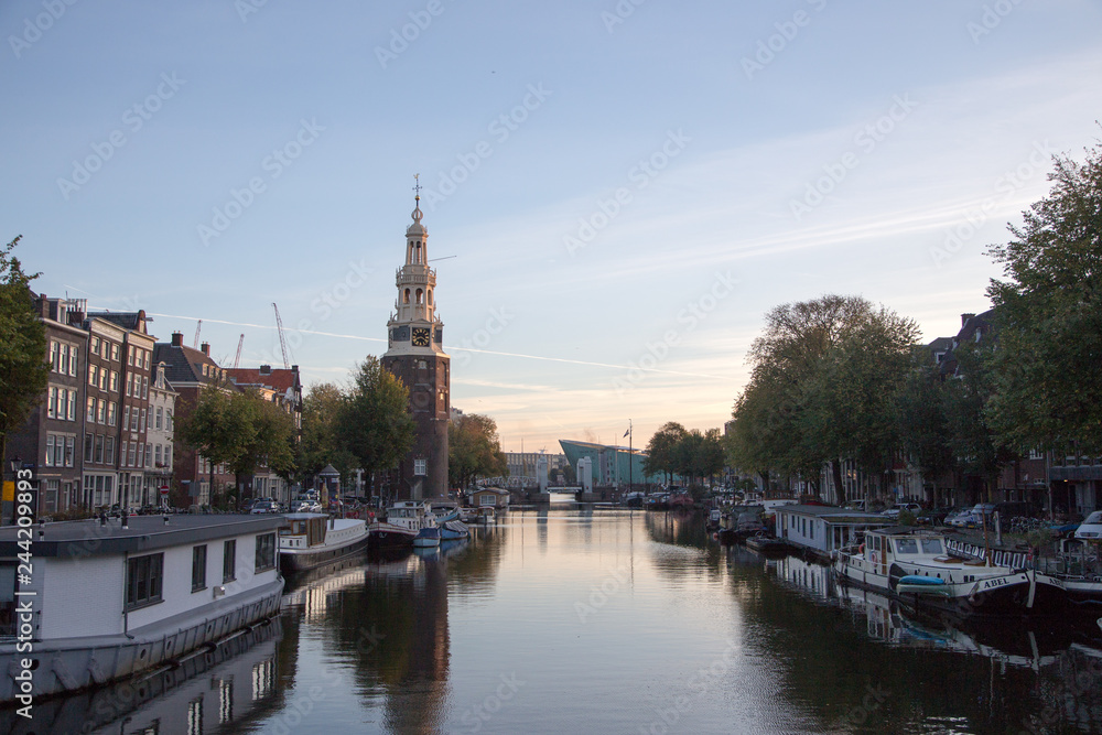 Fototapeta premium Typical view of canal embankment in historic center of city, Amsterdam, Netherlands.