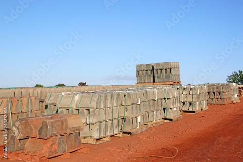 Concrete kerb stones on a construction site photo