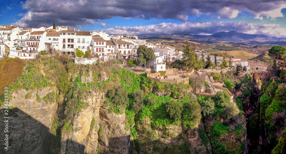 Ronda city panorama and canyon view. Panoramic view of town of Ronda, one of the famous villages in Andalucia, Malaga, Spain.