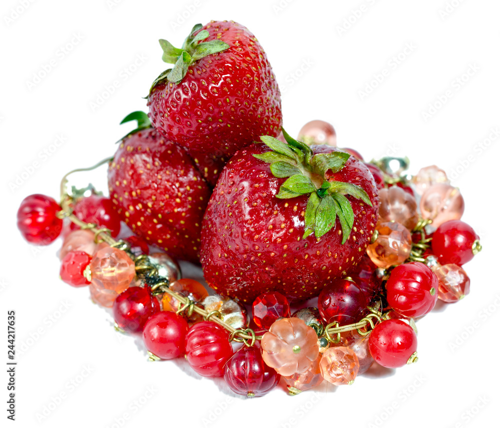 strawberry, ripe berries and bright red beads strawberry, ripe berries and bright red beads