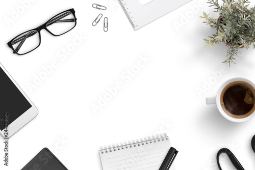 Office desk with accessories. Flat lay, top view composition with copy space in the middle.