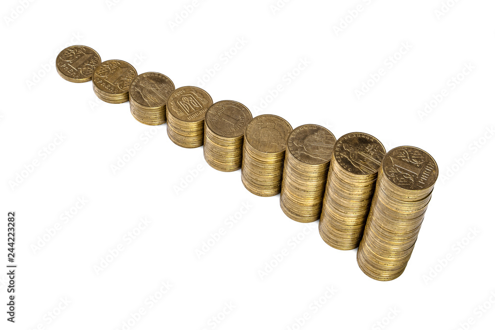 Growing chart from columns of golden coins isolated on white background Growing chart from columns of golden coins isolated on white background