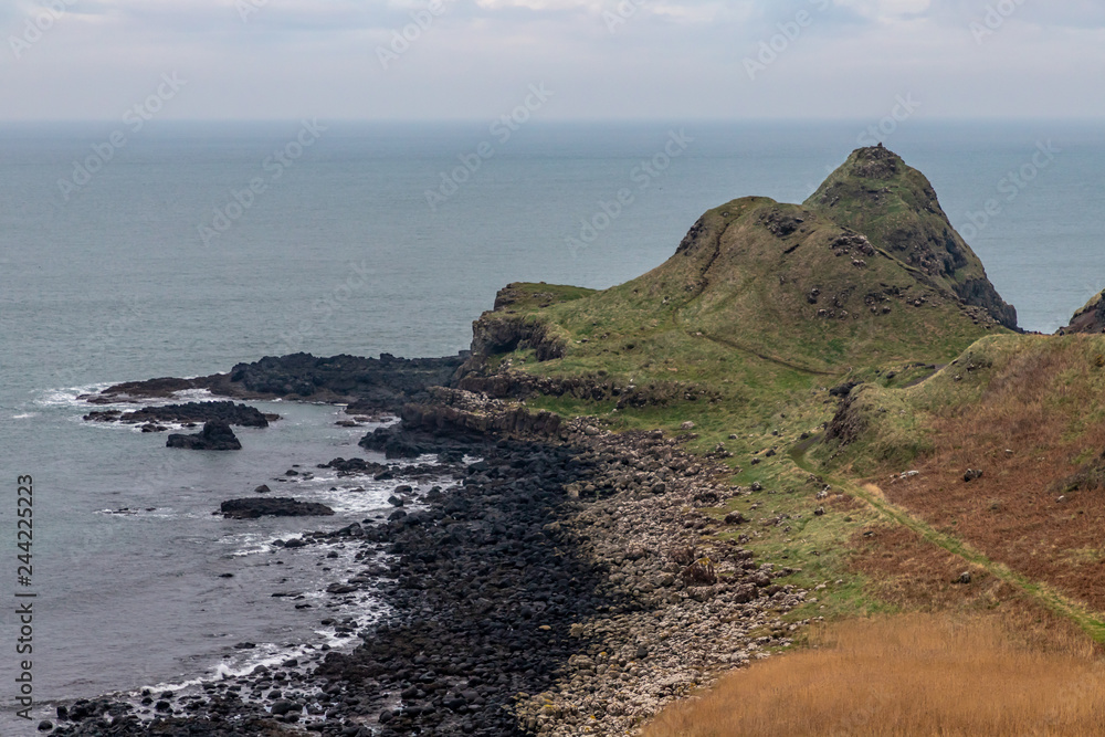 Beach and Mountains in Giant Causeway