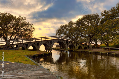 The historic landmark footbridge in Currituck Heritage Park leads to the Whalehead Club. This is located in the Outer Banks of North Carolina. 