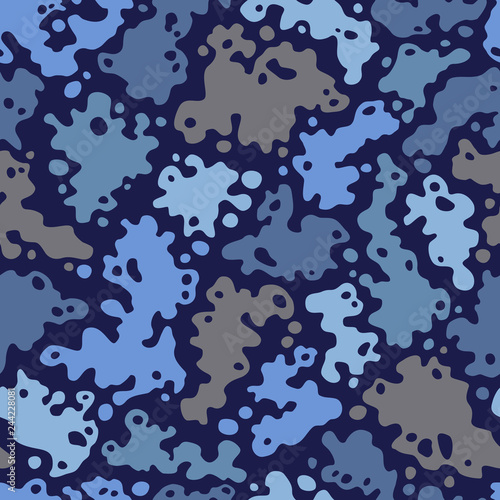Abstract paint spots seamless vector pattern in blue colors.